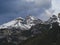 Snow covered alpen mountain peaks and forest in Stubaital or Stubai Valley near Innsbruck, Tirol, Austria, dramatic