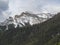Snow covered alpen mountain peaks and forest in Stubaital or Stubai Valley near Innsbruck, Tirol, Austria, dramatic