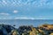 Snow Covered Arran and Lichen Covered Rocks on the Portencross Foreshore