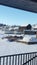 Snow covered barn and pool