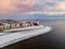 snow covered beach during wnter by Urk lighthouse in the Netherlands