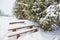 Snow-covered benches stand in high snowdrifts