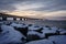 Snow covered boulder by the Ã˜resund Bridge