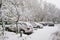 Snow covered cars at winter parking