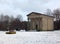 Snow covered chapel and gravestones in the former woodhouse lane cemetery in leeds now a park