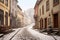 snow-covered cobblestone street in a quaint town