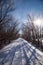 Snow covered cross country ski trail.