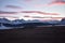 Snow covered Durmitor Mountain sunset with the blushing sky