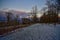 A snow covered evening at rib mountain state park in Wausau Wisconsin at sunset