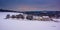 Snow covered fields and rolling hills in rural Carroll County, M