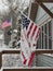 Snow covered, frozen American Flag