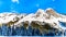 The snow covered granite rock face of Yak Peak in the Zopkios Ridge of the Cascade Mountain Range near the Coquihalla Summit