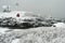 Snow Covered Lighthouse During Snowstorm in New England