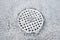 Snow covered manhole cover