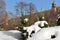 Snow-covered Moscow. Landscaped park after heavy snowfall. Snow on branch