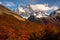 Snow-covered Mount Fitz Roy on beautiful fall day surrounded by lenga trees