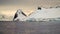 Snow covered mountain landscape in Antarctica around Cuverville Island.