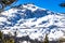 Snow Covered Mountain With Outside Train Tunnel