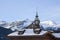 Snow-covered mountain range and church seen from the ski town of Wengen, Switzerland, Europe