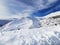 Snow covered mountains near Roundhill ski area on Two Thumbs Range on the South Island of New Zealand in winter afternoon