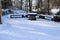 snow covered park benches and table at the Laacher See