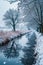 Snow Covered Park With Small Stream