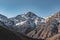 Snow covered peak of mount Toubkal in Morocco during spring on a sunny day. Atlas mountain range near Marrakesh. Start