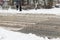 Snow covered pedestrian crossing on the road