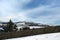 Snow covered pennine landscape with a view of fields and houses in heptonstall in calderdale west yorkshire surrounded by a stone