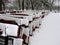 Snow covered picnic tables