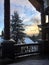 Snow covered pines seen from a porch, Lake Placid, New York