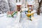 snow-covered public children playground in winter