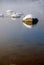 Snow-Covered River Rocks Reflecting on the Surface of the Payette River