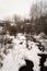 A snow covered river in Vail, Colorado during winter.