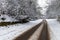 Snow covered road through