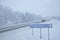 Snow covered road in Finnish Lapland, it's still snowing