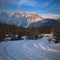 Snow covered road and mountain glow