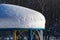 Snow covered roof of a park pavilion