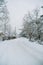 Snow-covered Russian village near the forest