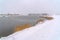 Snow covered shore of Oquirrh Lake in Daybreak UT