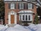 Snow covered suburban house