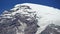 Snow covered summit of Mount Rainier.