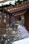 Snow-covered terrace decorated with Christmas trees