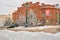 Snow-covered trees around the Khabarovsk Museum of Local Lore after heavy snowfall in the morning at sunrise. Trees in