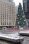 Snow covered Vancouver Christmas tree in front of historic Hotel Georgia