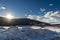 Snow-covered winter landscape with a trail in the ski area, reit im winkl