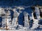 Snow-covered wooden bridge. Winter landscape. First snow. Winter trail in the forest.