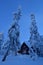 Snow covered wooden cottage on Mt. Seymour ski resort