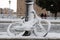 Snow covers the streets of Rome, Italy. Bicycle.