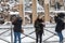 Snow covers the streets of Rome, Italy. Girls in the street to p